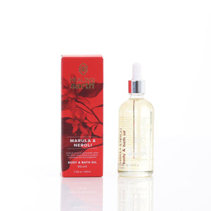Olio corpo e bagno Healing Earth Marula e Neroli con packaging rosso e oro elegante