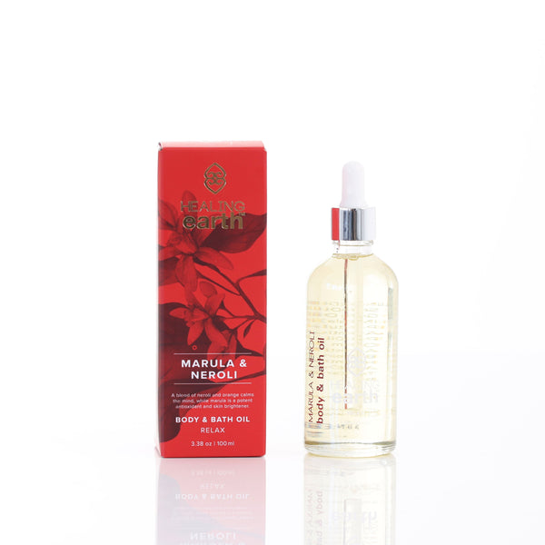 Olio corpo e bagno Healing Earth Marula e Neroli con packaging rosso e oro elegante